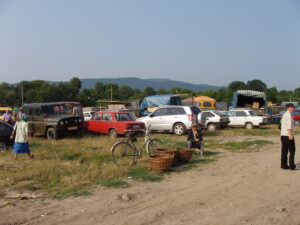 Basket weaver with wicker baskets at Kosiv Market - Ukraine