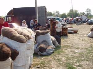 Merchants and farmers selling bales of combed wool at Kosiv Market - Ukraine