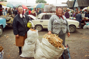 Farmer&#039;s wifes selling tobacco leaves at at Zabolotiv Market, Ukraine