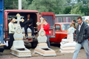 Craftsmen selling tombstones at Zabolotiv Market, Ukraine