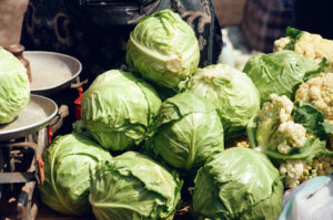 Close-up of cabbages and cauliflowers at Zabolotiv Market, Ukraine