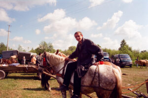 Young coachman and his horse at Kosiv Marktet - Ukraine