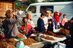 Farmers selling fine-cut tobacco at Zabolotiv Market, Ukraine
