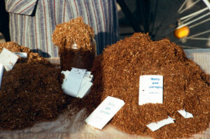 Selling fine-cut tobacco at Zabolotiv Market, Ukraine