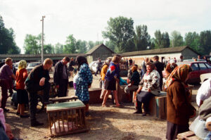 Farmers selling piglets at Zabolotiv Market, Ukraine