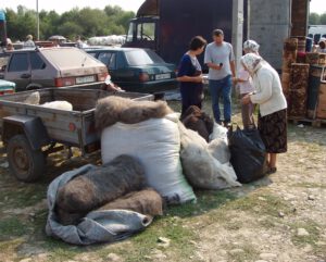 Ukrainian ladies buying wool at Kosiv Market - Ukraine